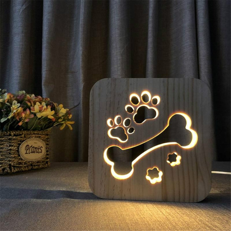 Wooden LED night lamp with glowing dog silhouette, paw prints, and bone outline
