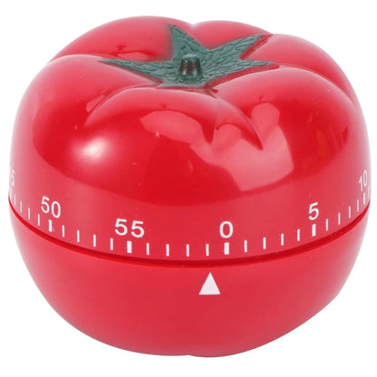 Red tomato-shaped mechanical kitchen timer with green stem and numbered dial