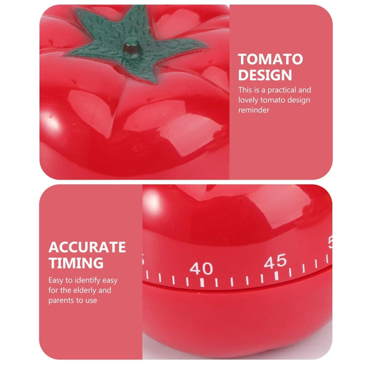 Glossy red tomato-shaped mechanical timer with green star stem and dial markings