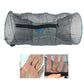 Folded fish trap net with dark gray mesh and black zipper closure across top
