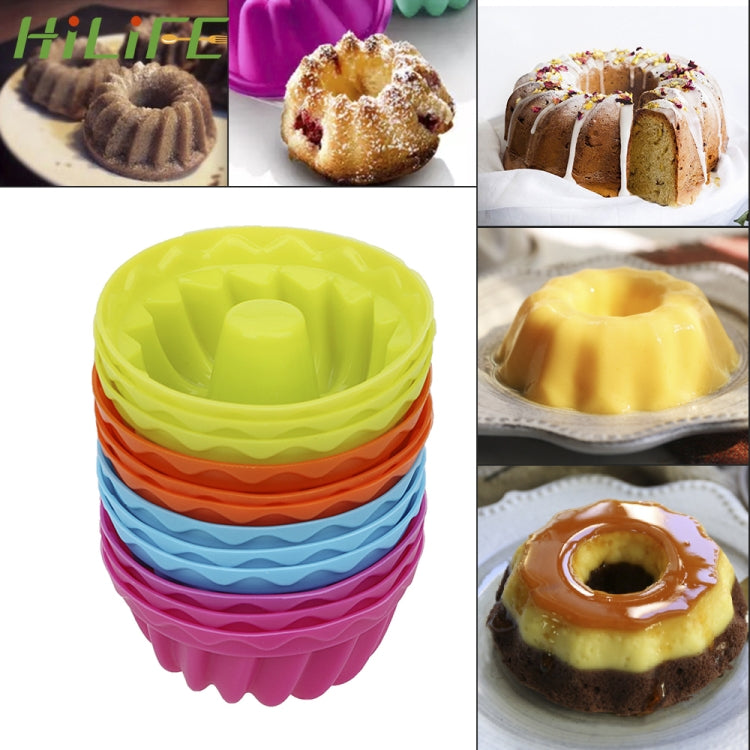 Stack of green silicone thread-shaped baking molds, pudding cup size