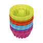 Stack of multicolor silicone thread-shaped baking molds, round pudding cups
