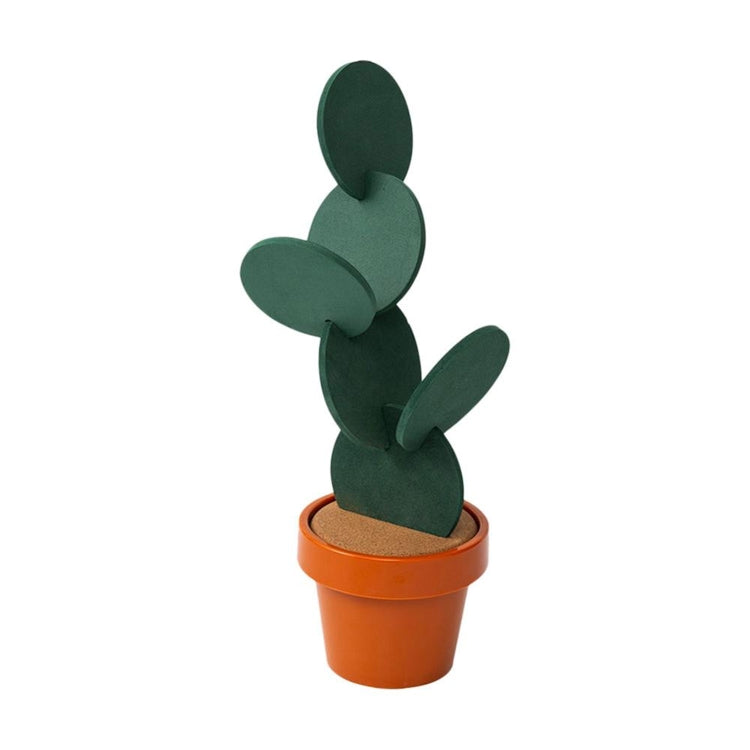 Green felt cactus coaster on cork insert, standing in an orange terra-cotta pot.
