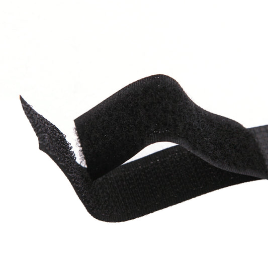 Close-up of black fabric strap loop on a stroller hook carabiner
