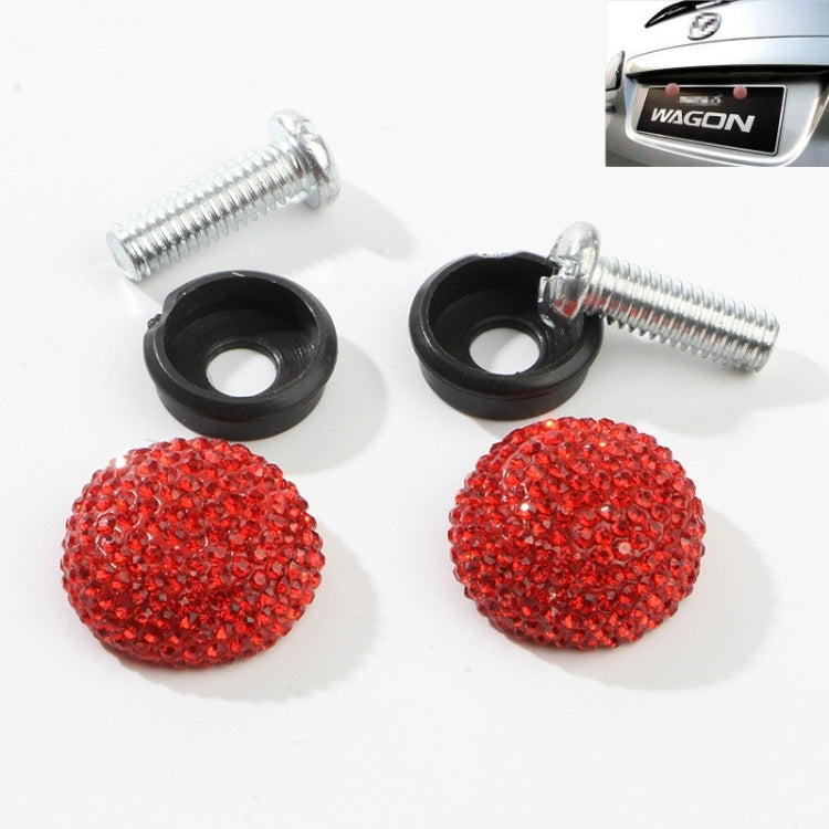 Pair of red rhinestone screw caps with chrome anti-theft screws and black seals