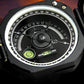 Compass dial close-up with degree markings, central needle, and green indicator lens