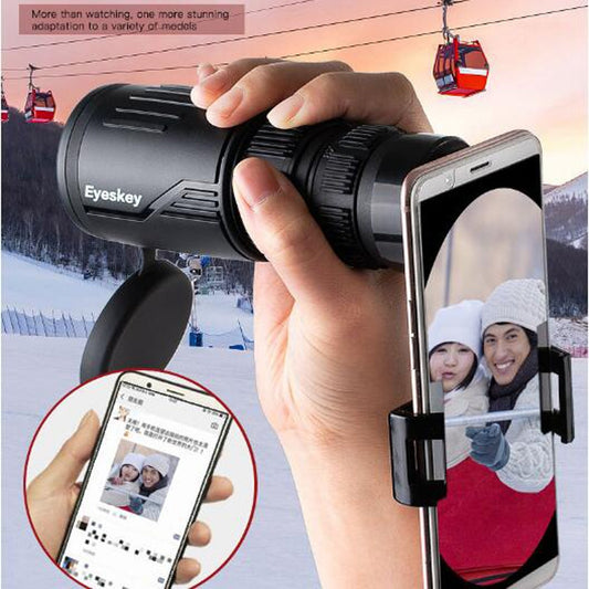 Black zoom monocular telescope with smartphone mount for taking photos
