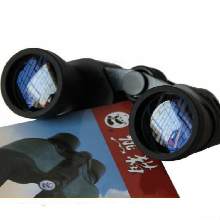 Binoculars with both eyepieces showing a blue-tinted image through lenses