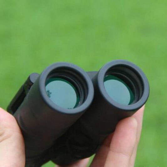 Night-vision pocket binoculars, close-up of two front objective lenses