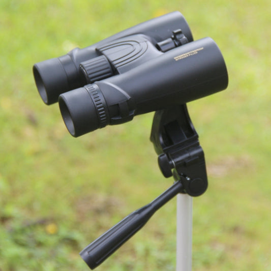 Portable mini telescope binoculars on outdoor mount, dark gray body and eyecups
