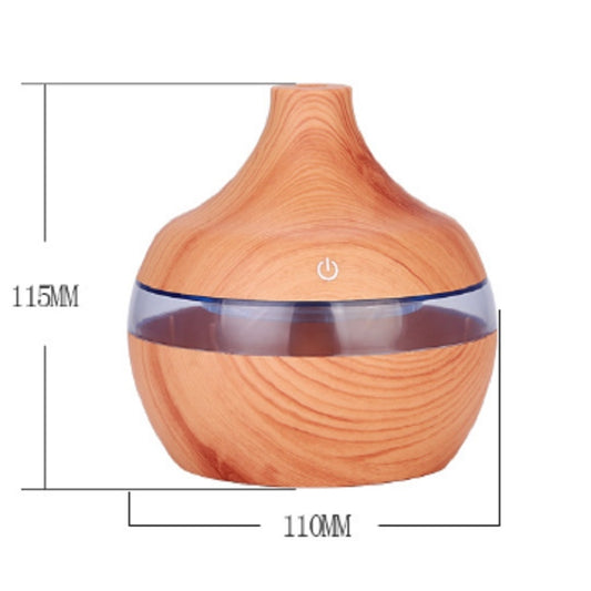 Light wood-grain drop humidifier with LED power button; 115mm x 110mm