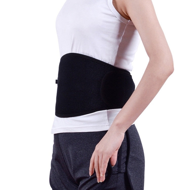 Black electric heating waist belt with strap, worn on waist over dark shorts