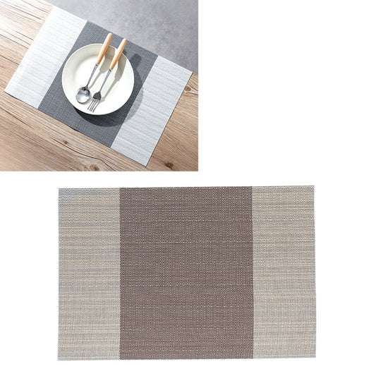PVC non-slip table mat with woven look and vertical block pattern in dark and light gray