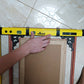 Yellow 0–270° angle gauge held against a board for line drawing
