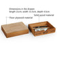 Wooden drawer storage cabinet with open top drawer showing contents and dimensions callout.