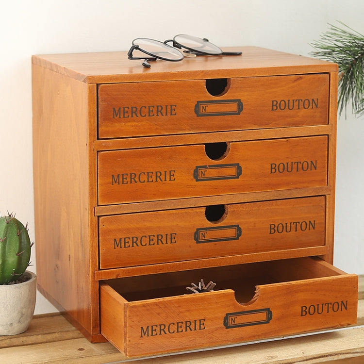 Wooden storage cabinet with four drawers and arched pulls; shoes placed on top surface.