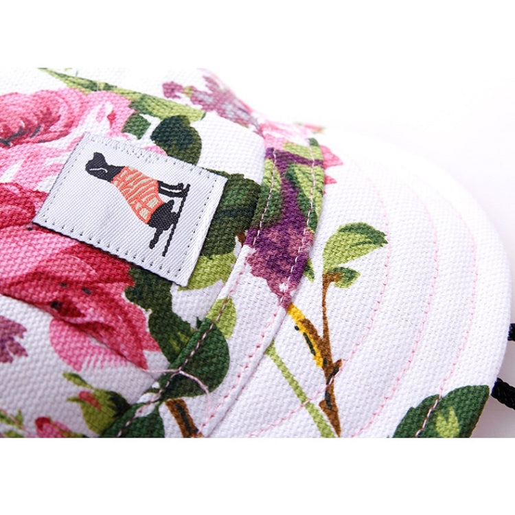 Adjustable pet baseball cap with pink floral fabric and front logo patch
