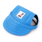 Blue adjustable baseball cap for pets with fabric logo patch and side opening