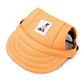 Orange adjustable baseball cap for pets with fabric logo patch and side opening
