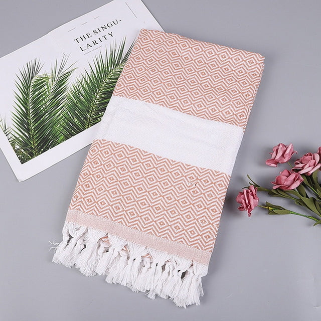 Peach and white zigzag striped cotton bath towel with tassel fringe ends