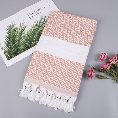 Peach and white zigzag striped cotton bath towel with tassel fringe ends