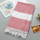 Red and white zigzag striped cotton bath towel with white band and tassel fringe