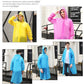 Pink hooded disposable raincoat with front button closure and full-length sleeves
