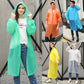 Hooded disposable raincoat with long sleeves and buttoned front, front view