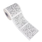 White toilet paper roll with sudoku puzzle paper unrolled diagonally
