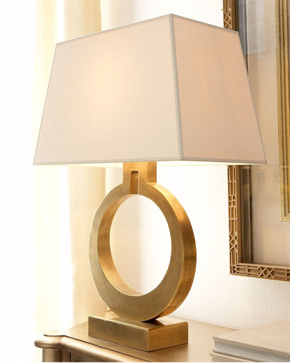 Retro bedside reading lamp with oval ring base and beige fabric shade
