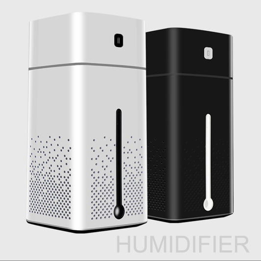 White and black ultrasonic air humidifiers side by side with front vent perforations
