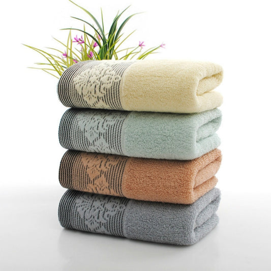 Thick towel stack with cream, light blue, brown, and gray patterned borders, 35x75cm