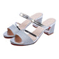 Silver glitter open-toe heeled sandals with crisscross straps and reflective metallic trim