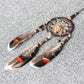Beaded single-ring dream catcher with a floral center and three hanging feathers