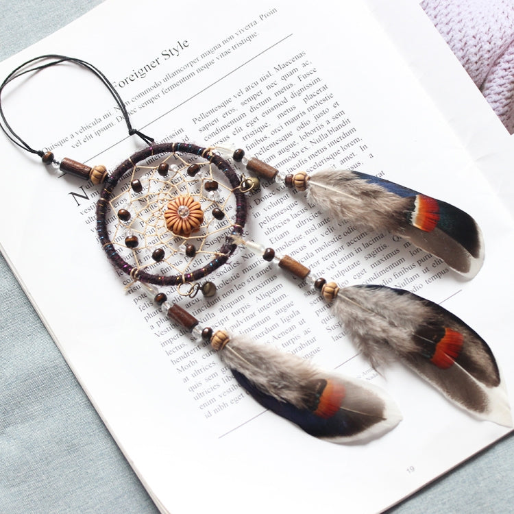Single-ring dream catcher with detailed web, beaded beads, and three multicolor feathers