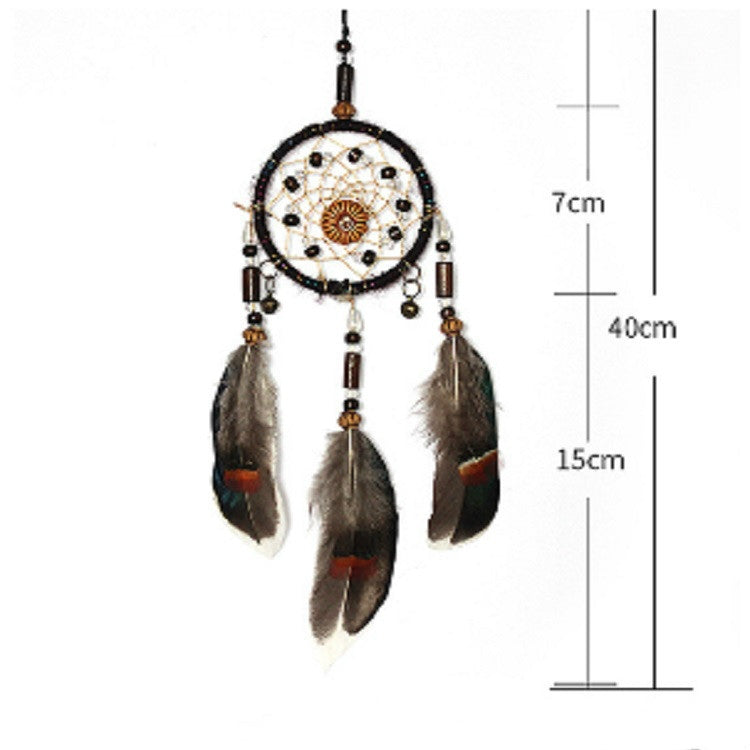 Hanging single-ring dream catcher with beaded web, circular center, and three feathers