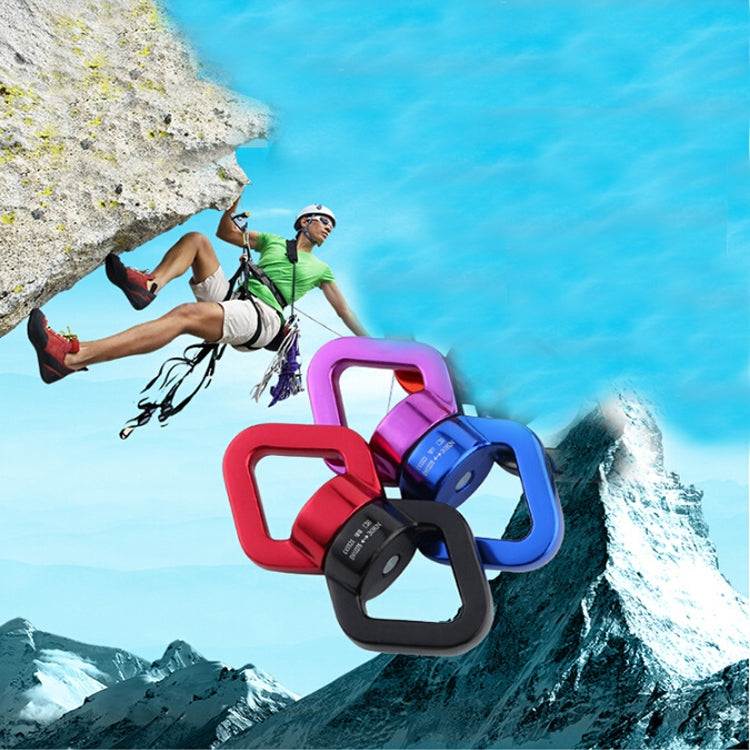 Red and black fixed connector carabiner in foreground on climbing gear background