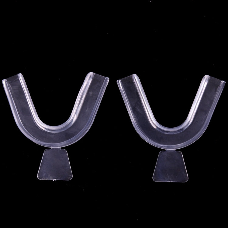 Two clear thermoforming mouthguard trays with adjustable bite pads