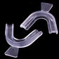 Clear U-shaped dental mouthguard tray pair with dark bite pads
