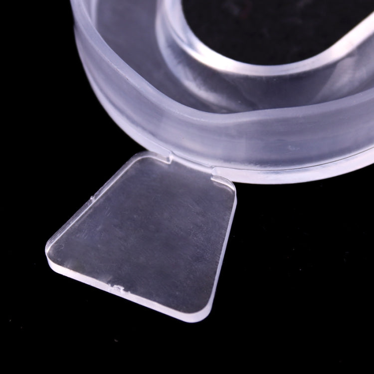 Close-up clear dental mouthguard tray with dark bite pad insert
