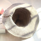 Cream wool wizard hat with wide brim and tall pointed crown, open interior