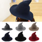 Assorted wool wizard hats in dark grey, navy, and red tones