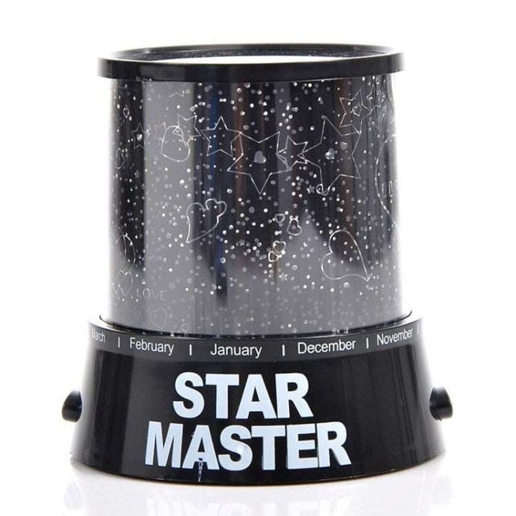 Black USB star projection lamp showing star icons through the lens housing