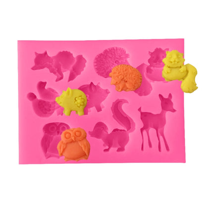 Animal-shape silicone mold sheet with embossed cat, dog, hedgehog, and rabbit shapes