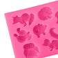 Silicone mold sheet close-up with embossed animal figures, including hedgehog and cat