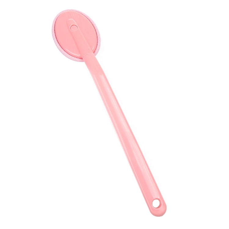 Pink single-sided back brush with round scrubbing pad and looped handle