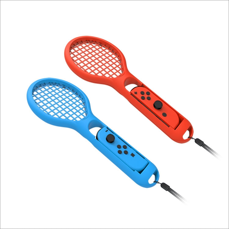 Two mini tennis rackets, red-orange and blue, lying side by side with game grips