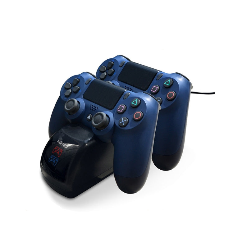 Dual charging dock holding two wireless controllers, blue bodies on black base