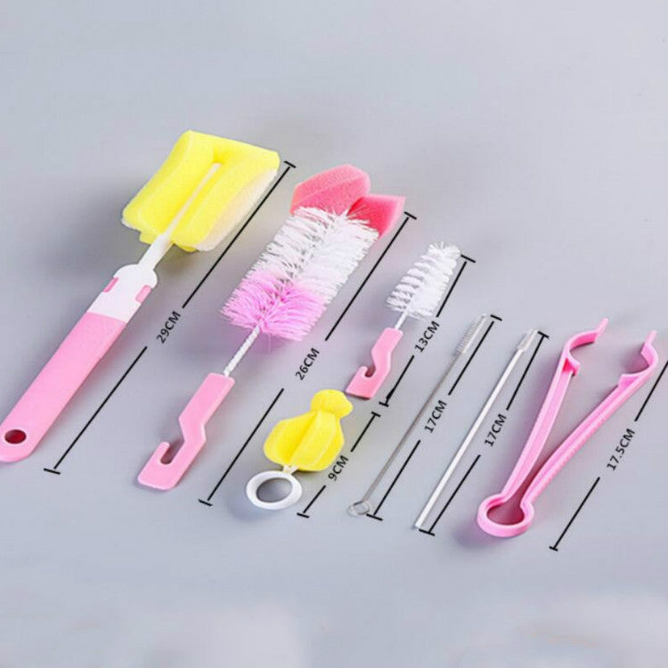 7-piece bottle brush set with pink, yellow, and white bristle heads and tools