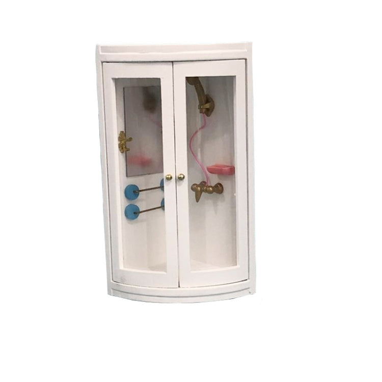 White dollhouse bathroom cabinet with clear doors showing blue towel bars and gold fixtures